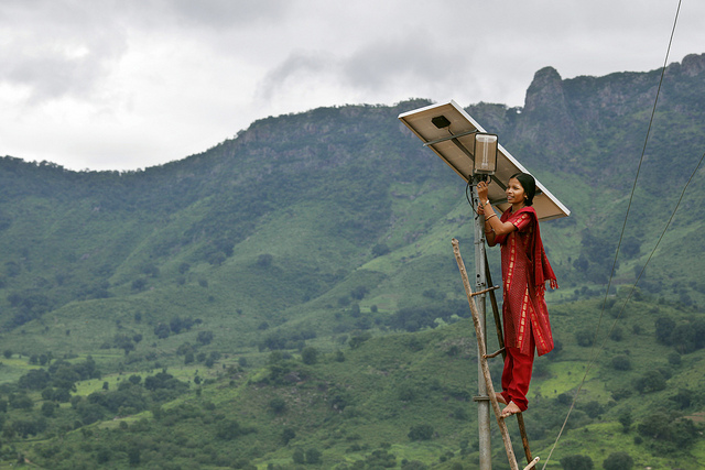 Solar engineer in the solar powered village of Tinginapu