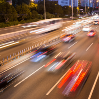 Cars driving on busy highway